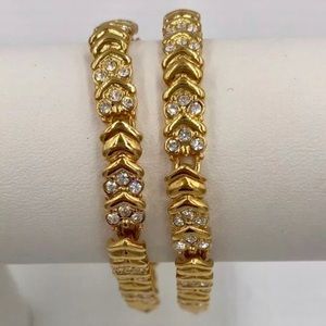 SWAROVSKI CRYSTAL AND GOLD TONE ARROW BRACELET